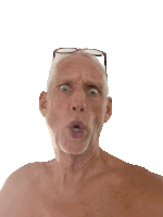 a shirtless man with glasses on his head makes a funny face