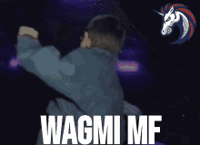 a man is dancing with the words wagmi mf in front of a unicorn