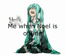 a girl with long green hair is crying while sitting on the floor .