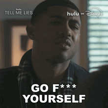 a man says go f *** yourself in front of a disney poster