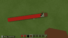 a screenshot of a minecraft game showing a red block with the word rt on it