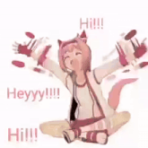 a girl with a cat ear is standing in front of a white wall .