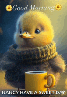 a duck with a scarf around its neck is holding a yellow cup of coffee