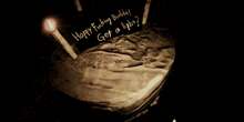 a birthday cake with candles and a sign that says happy fucking birthday got a light