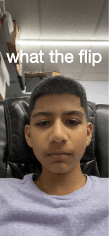 a young man is sitting in a chair with the words what the flip above his head