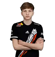 a young man wearing a black adidas shirt with red bull on the front