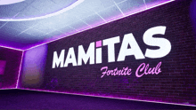 a brick wall with a sign that says mamitas fortnite club