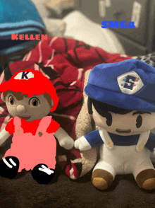 a stuffed mario and a stuffed smg4 are on a bed