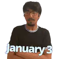 a man wearing glasses and a black shirt with the words january 3