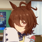 a girl with brown hair is standing in front of a sign that says " event ning team "