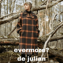 a woman in a plaid coat stands in the woods with the words evermore de julian above her