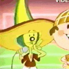 a cartoon character is wearing a sombrero and singing into a microphone .