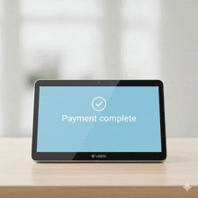 a veira tablet displays a payment complete screen