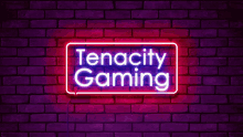 a neon sign that says tenacity gaming on it