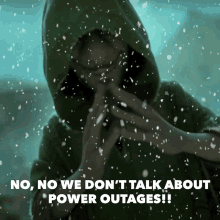 a person in a green hoodie says no we don t talk about power outages