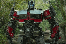 a large robot with a transformers logo on its chest