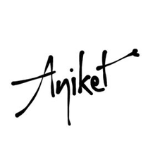 a black and white logo for aniket with an arrow pointing to it .