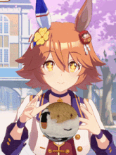 a girl with a flower in her hair is holding a puffer fish in her hands