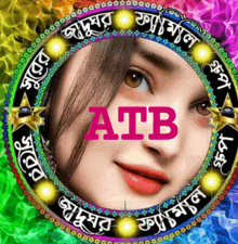 a woman 's face is in the center of a circle with atb written on it