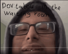 a man wearing glasses and a hoodie has the words pov tabou in the waiting room written above him