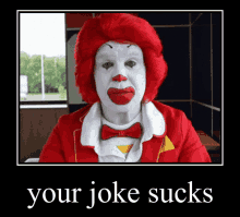 a picture of a mcdonald 's clown with a caption that says " your joke sucks "