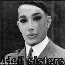 a black and white photo of a man in a suit and tie with the words `` hell sisters '' written above him .