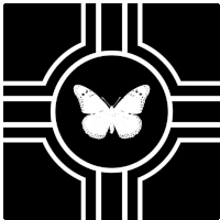 a white butterfly is in the center of a black and white design