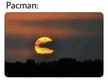 a picture of a sunset with a pacman face on it