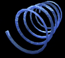 a blue spiral on a black background that looks like a slinky