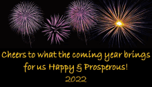 a fireworks display with the words cheers to what the coming year brings for us happy & prosperous 2022