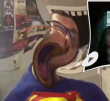 a man wearing a superman shirt has a swirling face