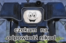 a robot with a smiling face and the words " czekam na odpowiedz nikod " written below it