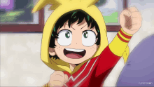 a cartoon character wearing a yellow hood and a red shirt