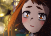 a close up of a girl 's face with orange hair