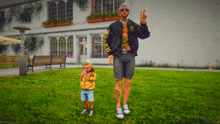 a man in a black jacket with the word gucci on it stands next to a child