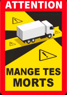 a sign with a truck and the words attention mange tes morts