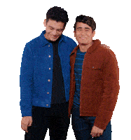 a man in a blue jacket is standing next to another man in a brown jacket