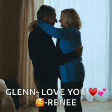 a man and woman hugging with the words glenn love you renee in the corner
