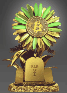 a statue of a flower with a coin in the center and a tombstone that says rip y