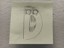 a sticky note with a drawing of an owl on it