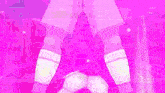 a pink background with a person 's legs and a soccer ball
