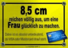 a yellow sign with a credit card on it that says 8.5 cm