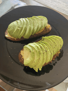 two slices of avocado on toast on a plate