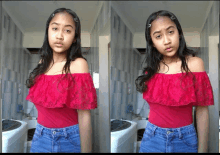 a girl in a red off the shoulder top is standing in front of a washing machine