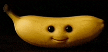 a banana with a smiling face on it 's face .