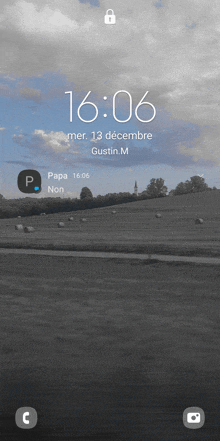 a phone screen with a lock screen that says 16:06 mer 13 decembre gustin.m