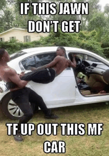 two men are standing next to a white car and one of them is carrying another man on his back .