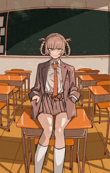 a girl is sitting on a desk in a classroom