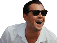 a man wearing sunglasses and a white shirt is laughing with his mouth wide open .