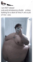 a fat man is taking a selfie in a mirror .